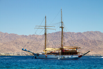 Eilat/ Israel - AUG 20 2020 : sailboat anchored in the Gulf of Eilat