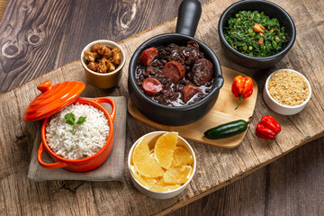 FEIJOADA: typical and traditional Brazilian cuisine, paired with Caipirinha and beer.