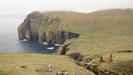 Ásmundarstakkur sea stack on Suðuroy Island in the Faroe Islands.