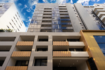 Residential high rise apartment building in inner Sydney suburb NSW Australia. Residential complex in leafy suburbia. Urban living high density suburban city 