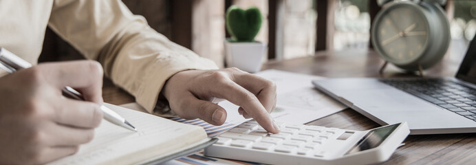 Head of accounting is recording the company's financial growth statistics using graphs as a...