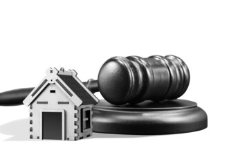 Abstract photo with wooden gavel and abstract house isolated on white background as symbol of sale...