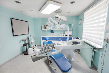 Dental office with equipment for procedures, there is also a microscope