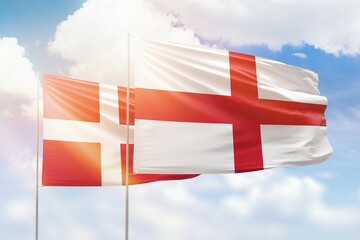 Sunny blue sky and flags of england and denmark - obrazy, fototapety, plakaty