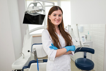 Portrait of a young beautiful female dentist