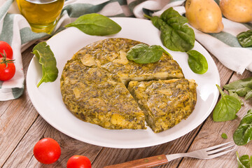 Spanish omelette with spinach.