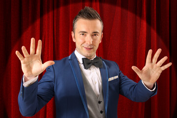 Magician performing act of magic and illusion