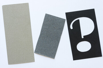 two rectangle (text boxes?) and black stencil question mark