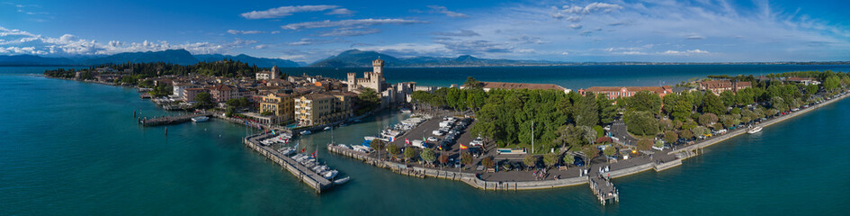 Aerial view of Sirmione, an ancient village on southern Garda Lake. Italian castles Scaligero on...