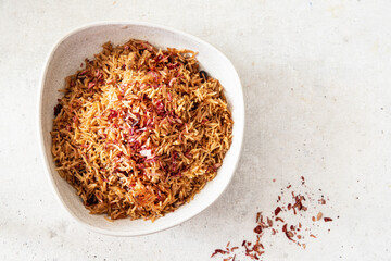 Rice with spices and red onion