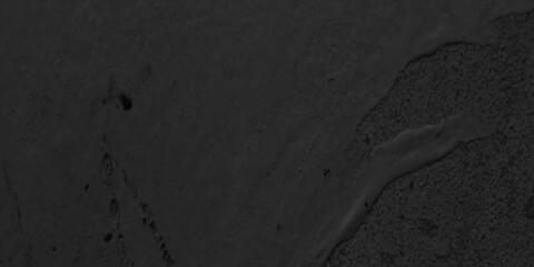 Abstract luxury black background with vintage grunge texture, Old seamless black wall background with space for your text and for making any construction related works.
