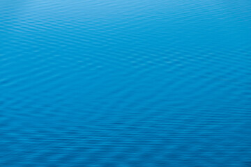 Fototapeta na wymiar Close up of water rippling on a lake.