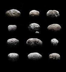 Asteroids of the solar system on a black background. Composition of space stones covered with craters. Collection of meteorites and comets. 