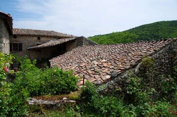 Fototapeta na wymiar Roofs in the small village of Veyrines in Ardeche in France, Europe