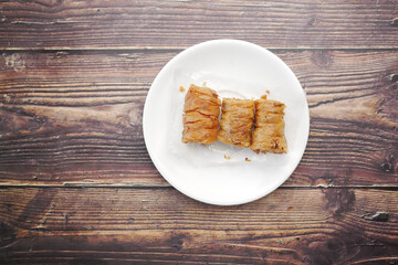  top view of arabic dessert baklava on a plate 