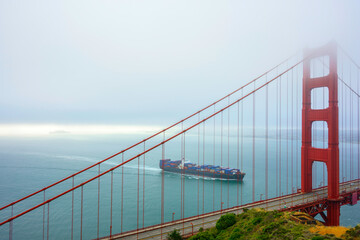 San Francisco Bay and container ship passing Golden Gate Bridge 