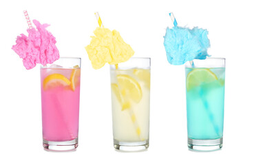 Cold, colorful cotton candy lemonade summer drinks. Three colors in tall glasses isolated on a...
