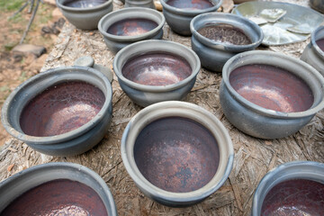 fired earthenware removed from the kiln. Mugs, pots, plates and everything else beautiful and useful. Latvian national cultural heritage