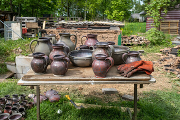 fired earthenware removed from the kiln. Mugs, pots, plates and everything else beautiful and useful. Latvian national cultural heritage