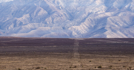 Stright Line and andes mountains in background landscapes - Nazca, Peru
