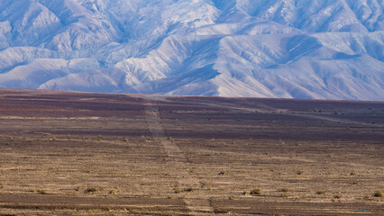 Nazca Lines and andes mountains in background landscapes - Nazca, Peru