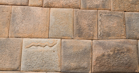 Megalithic stone walls 7 snakes carvings, craftmenship in ancient city of cusco.