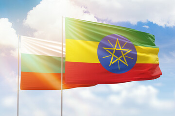 Sunny blue sky and flags of ethiopia and bulgaria