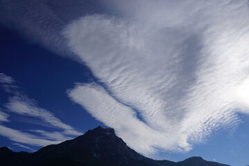 funky clouds in the mountains of the southern alps, france above the Morgon peak