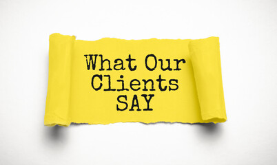torn paper and text what our clients say on white background