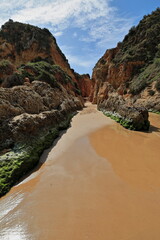 Narrow gorge between cliff and seastack-Praia Tres Irmaos Beach. Alvor-Portimao-Portugal-316