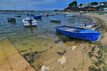 Fototapeta na wymiar Moored-stranded-anchored boats in The Ria do Alvor Estuary. Portimao-Portugal-319