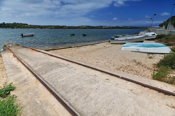 Cement slipway-steel rails-launching and hauling boats. Ria do Alvor Estuary-Portimao-Portugal-324