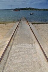 Cement slipway-steel rails-launching and hauling boats. Ria do Alvor Estuary-Portimao-Portugal-325