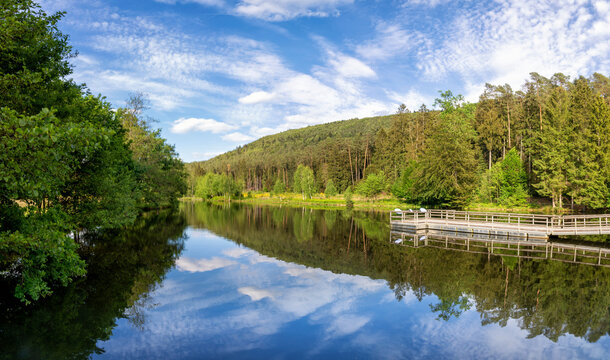 View at a lake in the Spiesswoogtal valley near Fischbach bei Dahn