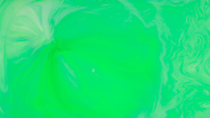 Green Fluid Art Background. Abstract liquid trendy backdrop. Different shades of green on a blurry surface