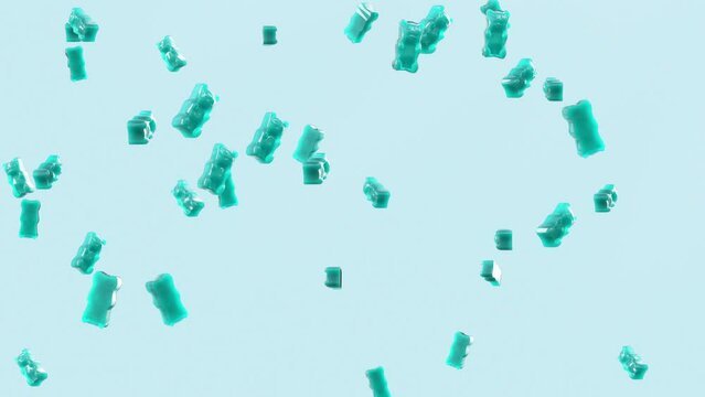 Slow Motion. Seamless Loop Background. Gummy Bears Candy. Aquamarine jelly candy bears falling on light blue background. Gummy Bears 4K, Ultra HD resolution stock footage