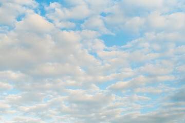 White clouds against blue sky. Daylight, cloudy day. Nature, freedom and peaceful concept