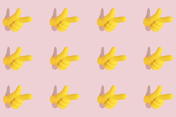 Bright yellow pointer symbol icon on pastel pink background. Hand gesture, attention or essence concept. Seamless pattern, isometric view.