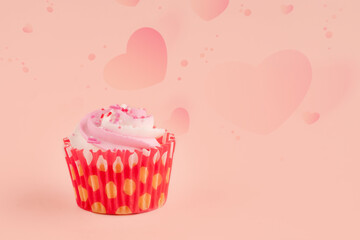 berry muffin in red wrappers on a pink background high-quality photos for calendar and cards. Space for text