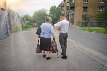 Young guy evangelizing at the street