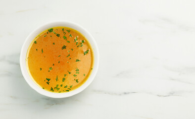 bowl of fresh chicken bouillon