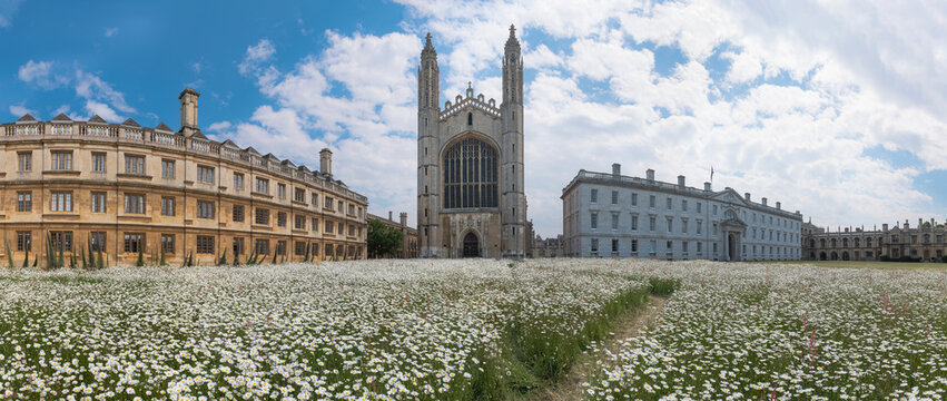 King's College Chapel in Cambridge Panoramic Photo with its lovely garden with Flowers and a Beautiful Skyline