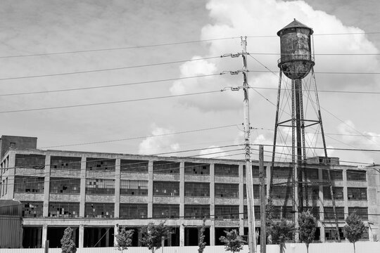 Abandoned Automotive Plant. Closed And In Disrepair, Former Auto Factories Deteriorate And Create City Blight.