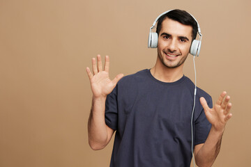 handsome man headphones music technology entertainment cropped view