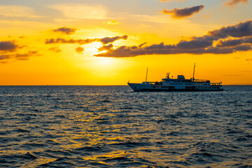 Sunset and ferry in Istanbul. Famous ferries of Istanbul background photo
