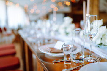 Banquet table with wedding and festive serving. Wedding, birthday, party, event concept.
