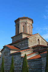 Fototapeta na wymiar Saint Naum Monastery in North Macedonia with a blue cloudless sky