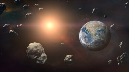 Naklejka na ściany i meble Asteroids with Earth planet in outer space. Elements of this image furnished by NASA.