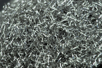 background of steel tangled metal fibers, close-up macro photography