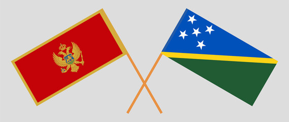 Crossed flags of Montenegro and Solomon Islands. Official colors. Correct proportion
